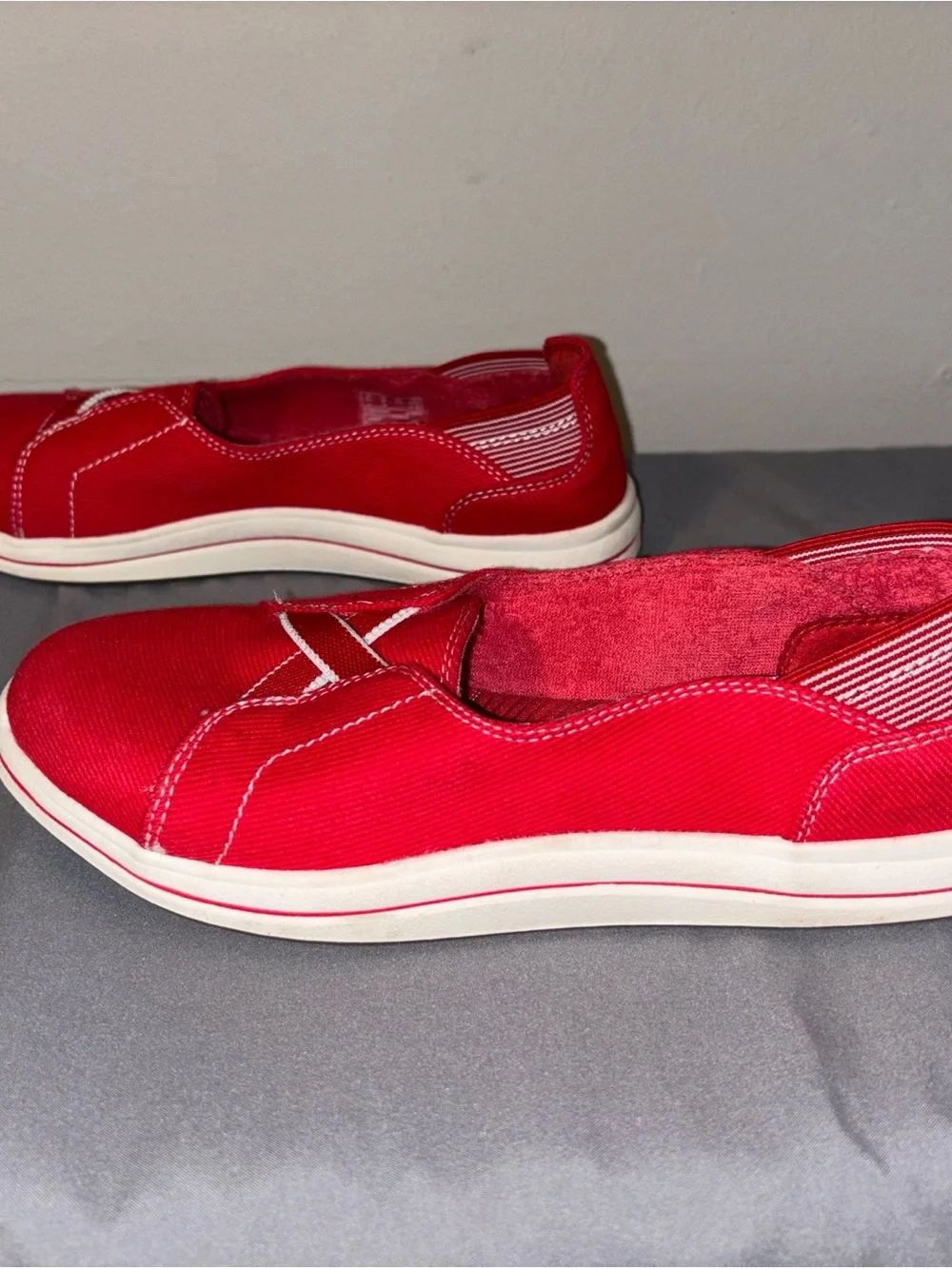 Clarks Women’s Red Slip-On Canvas Sneakers cloudsteppers
